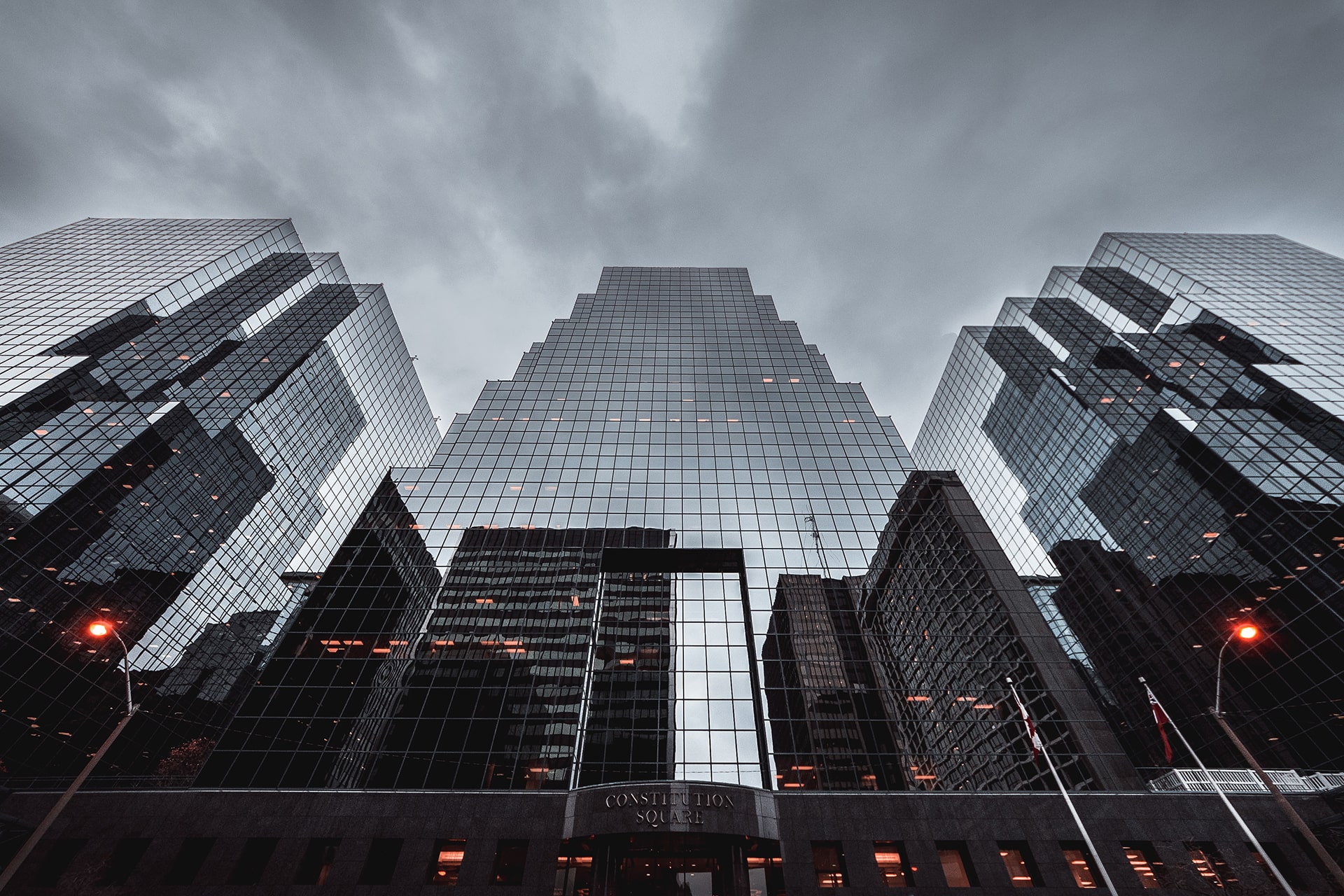 Modern glass office towers, representing enterprise-grade infrastructure